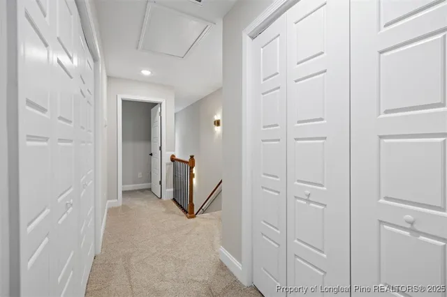 a view of a hallway with entryway