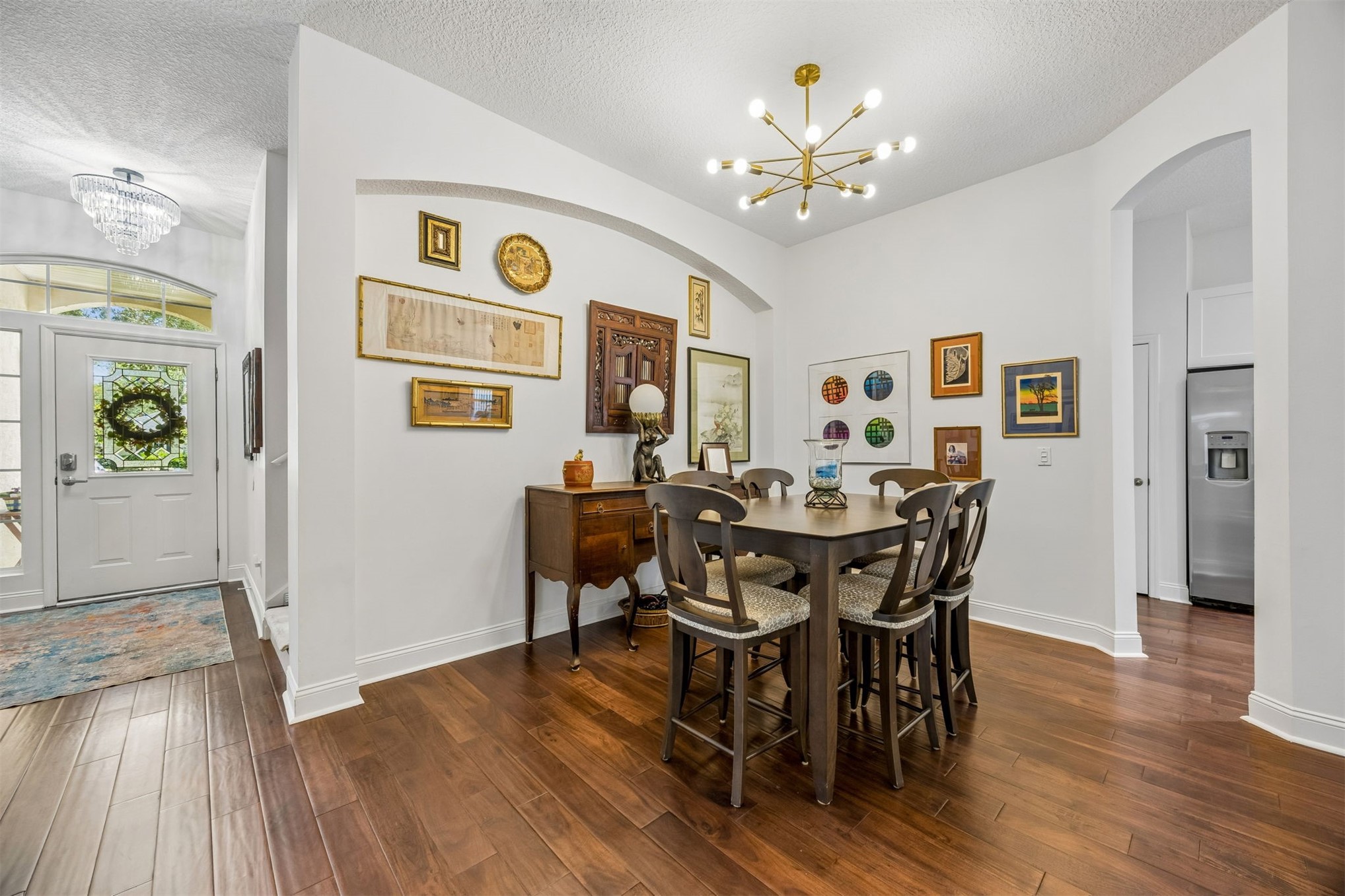 86107 Remsenburg Drive Fernandina Beach, FL 32034 - Photo 7 of 58 a view of a dining room with furniture and wooden floor