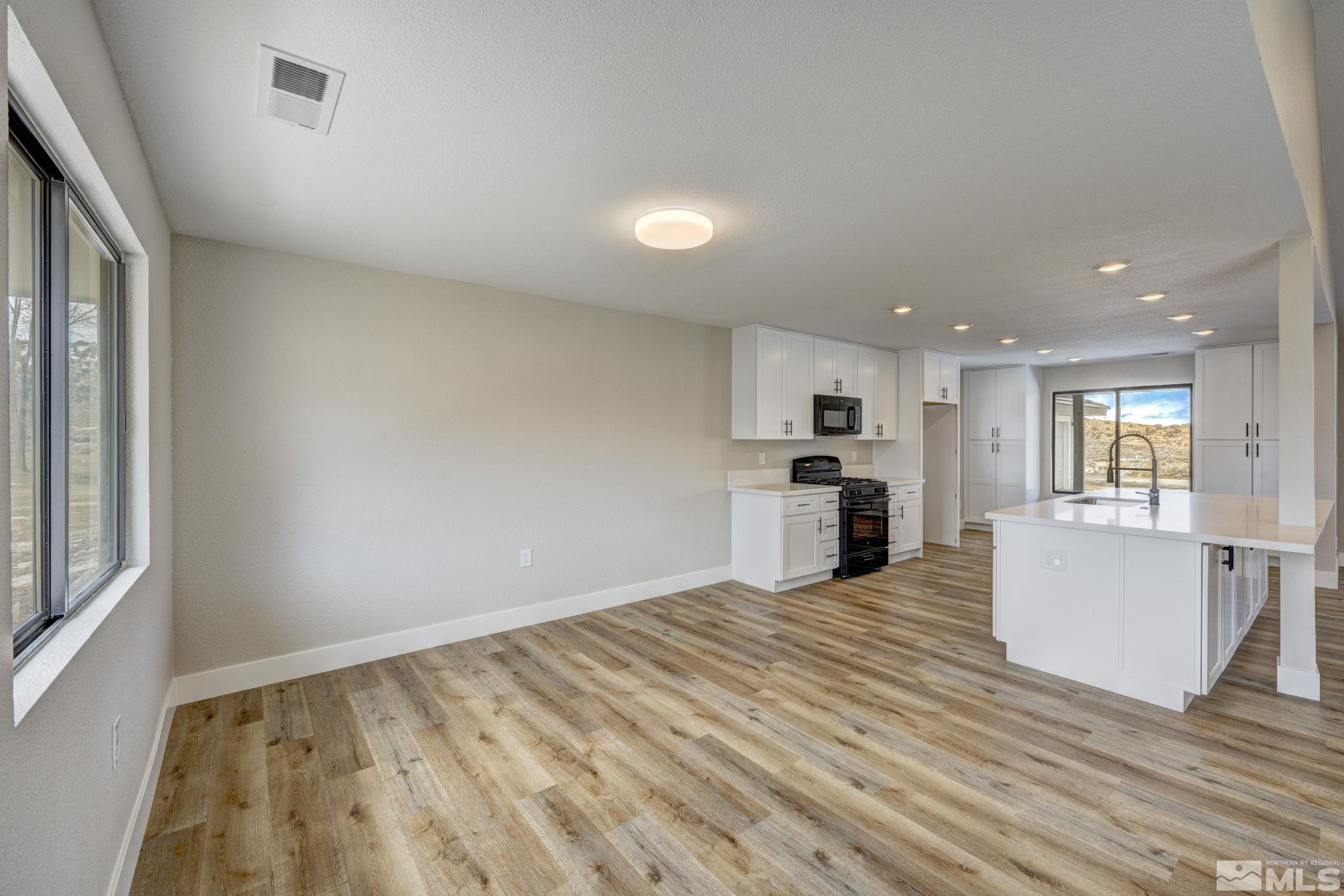 2900 Right Hand Canyon Road Reno, NV 89510 - Photo 18 of 29 a view of a kitchen with microwave and cabinets