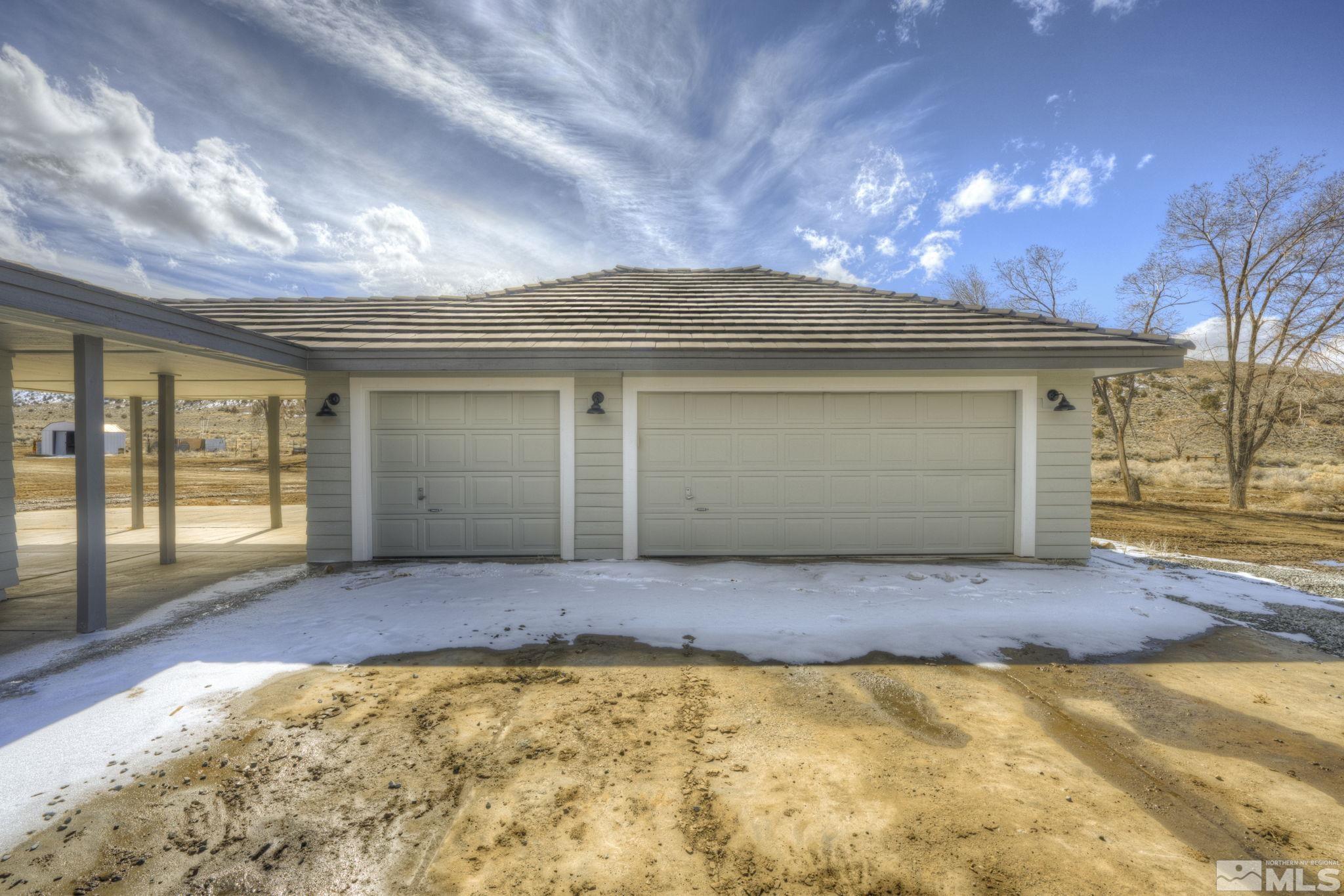 2900 Right Hand Canyon Road Reno, NV 89510 - Photo 3 of 29 a view of yellow house with a yard