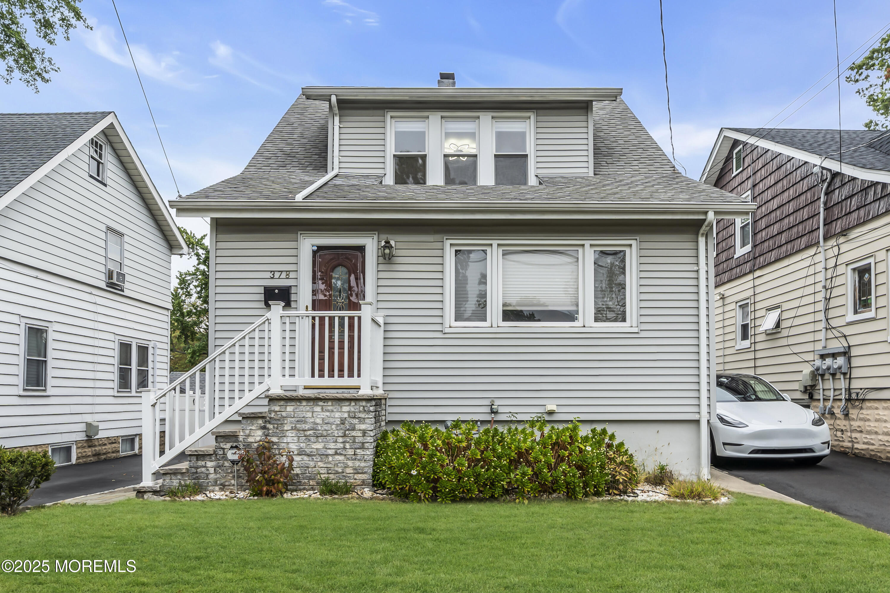 378 Burroughs Terrace Union, NJ 07083 - Photo 1 of 1 a front view of a house with a garden