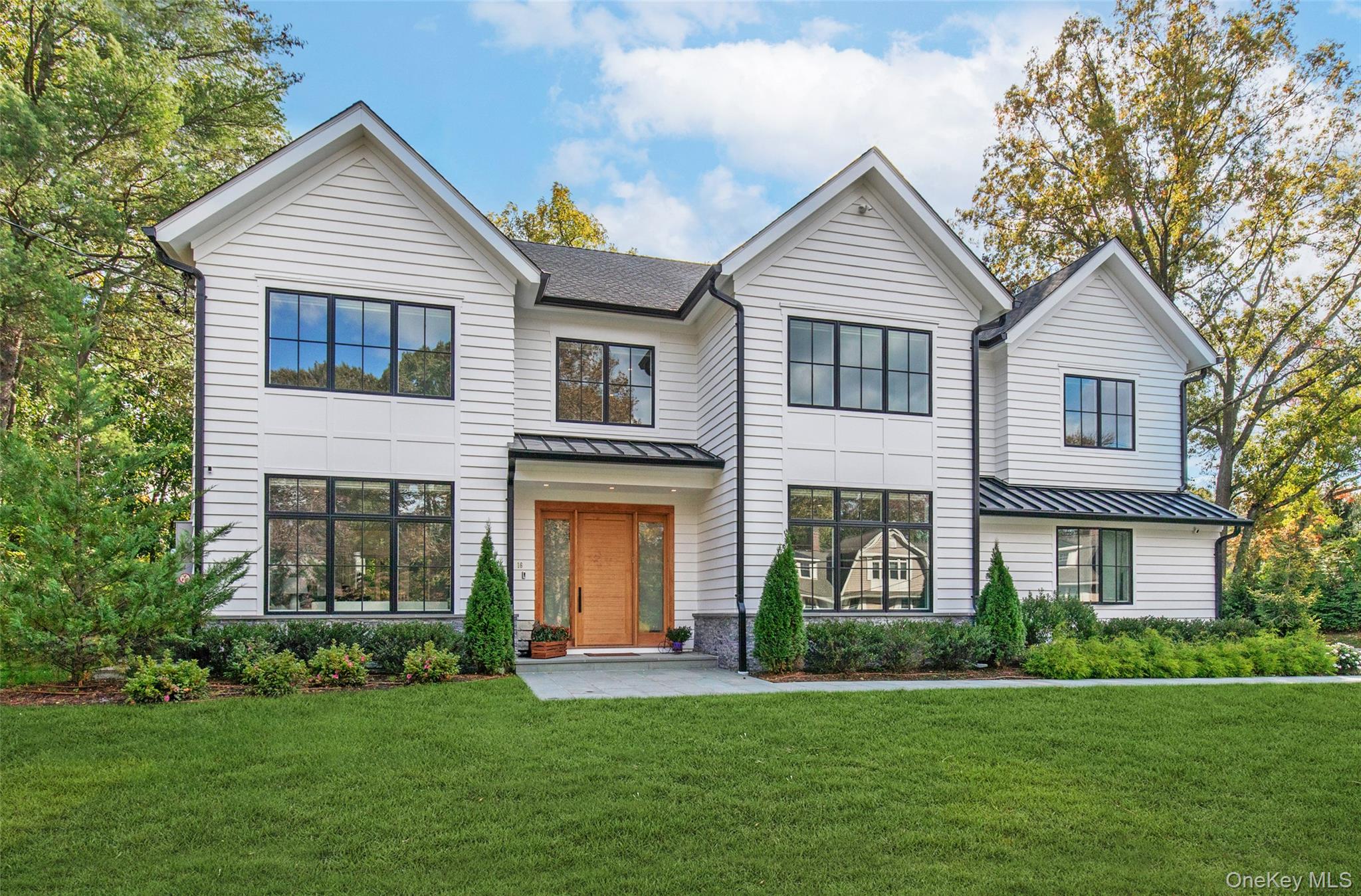 View of front of home showcasing striking modern architecture