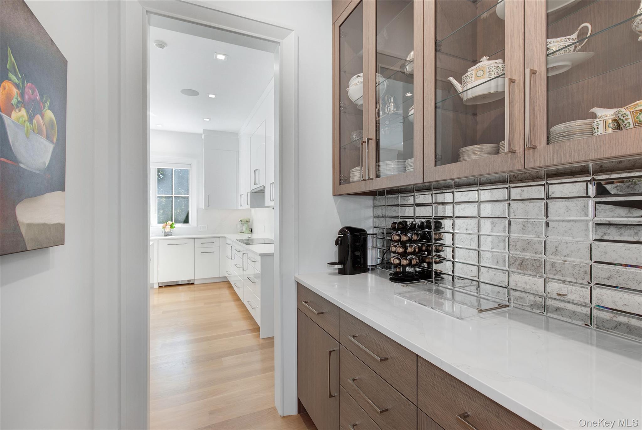16 Myrtledale Road Scarsdale, NY 10583 - Photo 18 of 48 Butler's Pantry located off the dining room featuring elegant custom cabinetry for easy formal and informal entertaining