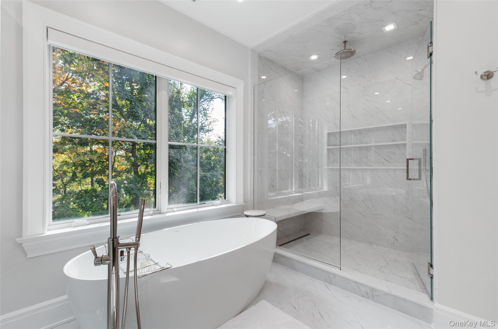 16 Myrtledale Road Scarsdale, NY 10583 - Photo 27 of 48 Spa like bath with radiant heated floors, large soaking tub, and generous glass enclosed shower with bench