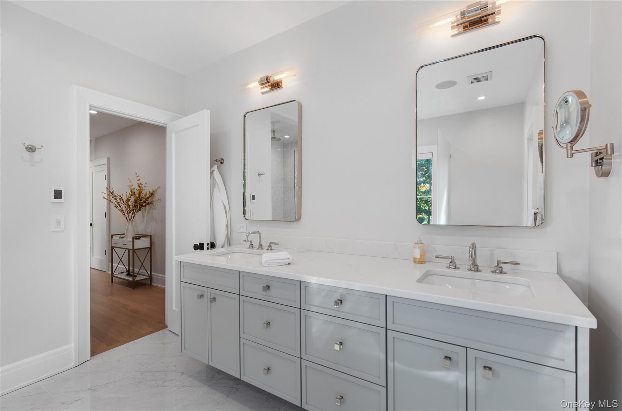 16 Myrtledale Road Scarsdale, NY 10583 - Photo 28 of 48 Primary bath with dual vanities, floating tub and separate glass enclosed shower