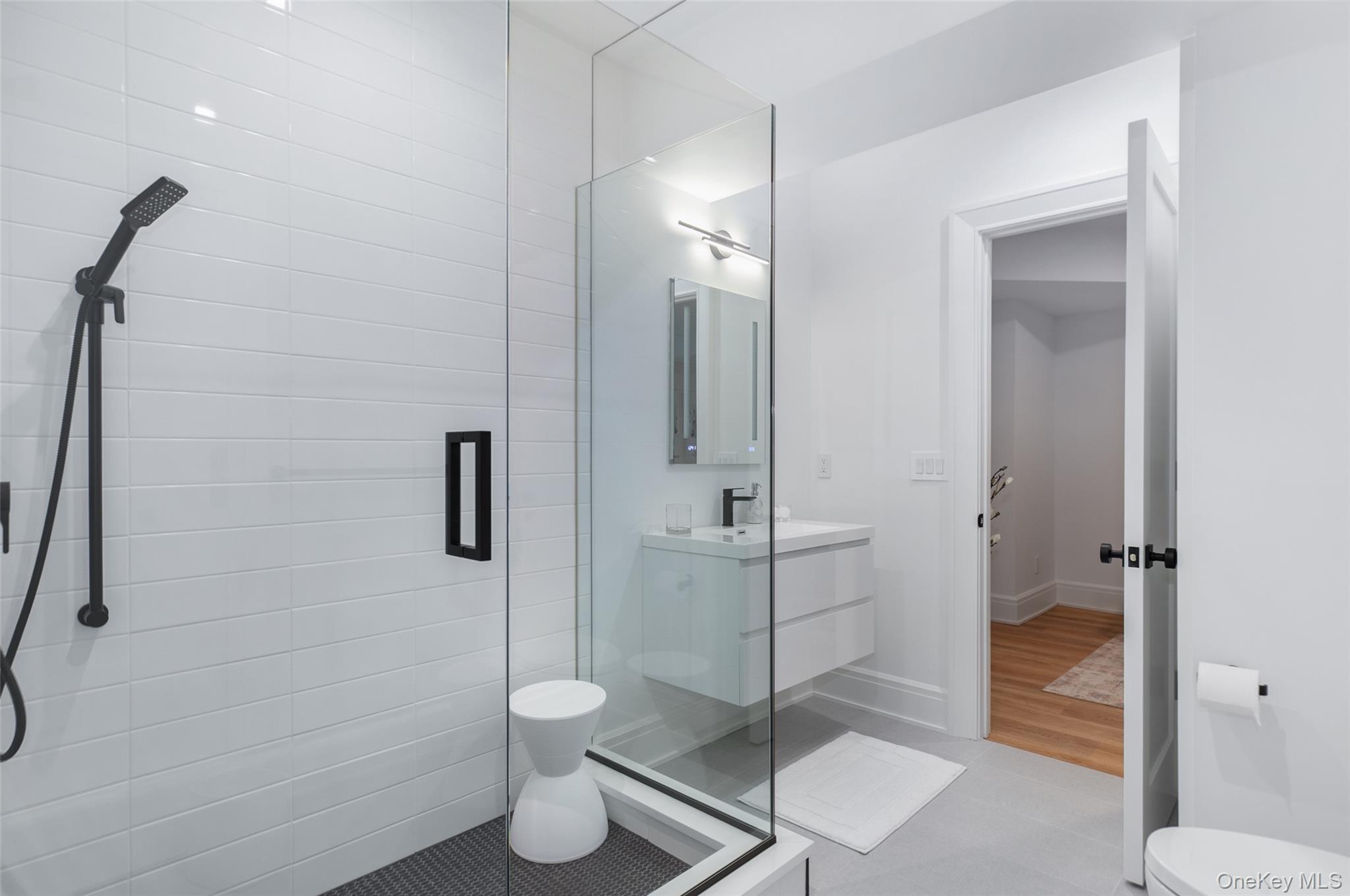 16 Myrtledale Road Scarsdale, NY 10583 - Photo 38 of 48 Bathroom with vanity and a shower stall