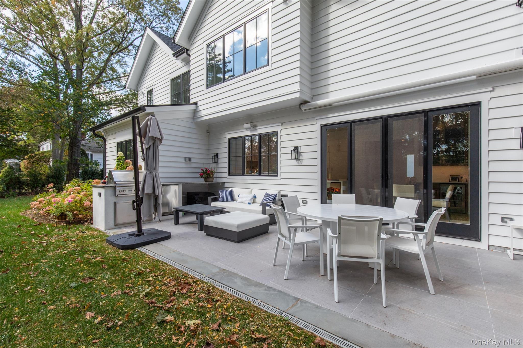 16 Myrtledale Road Scarsdale, NY 10583 - Photo 42 of 48 View of patio featuring an outdoor patio and built in outdoor kitchen