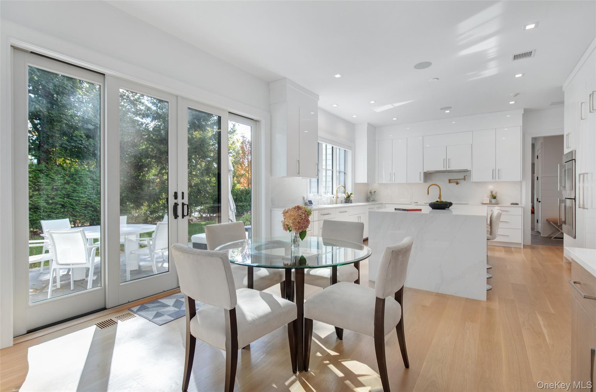 16 Myrtledale Road Scarsdale, NY 10583 - Photo 10 of 48 Breakfast Room with glass doors to patio and property