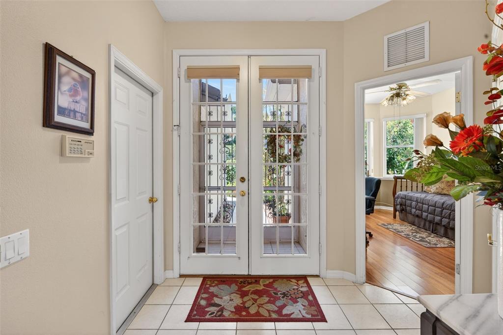 4266 Summertree Road Venice, FL 34293 - Photo 32 of 64 a view of entryway with wooden floor