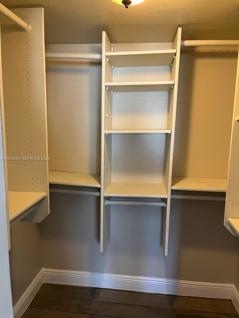 8051 South Colony Circle, Unit 109 Tamarac, FL 33321 - Photo 14 of 19 a close view of walk in closet