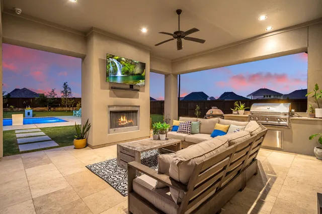 a bed room with furniture and a fireplace