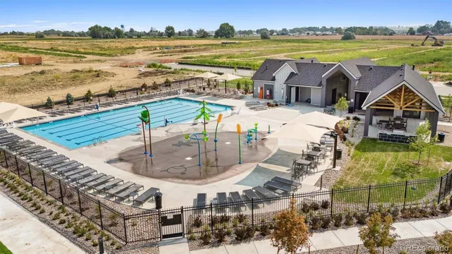 aerial view of a house with a swimming pool