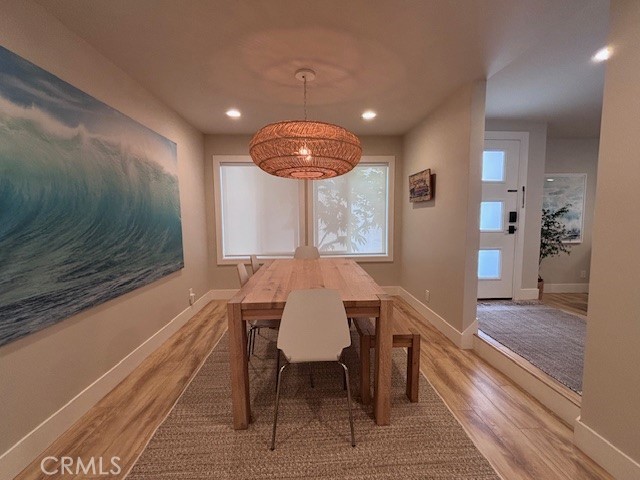 2920 Camino Capistrano, Unit 9D San Clemente, CA 92672 - Photo 12 of 54 a view of a dining room with furniture window and wooden floor