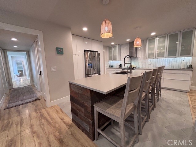 2920 Camino Capistrano, Unit 9D San Clemente, CA 92672 - Photo 13 of 54 a dining area with a table chairs and a kitchen view