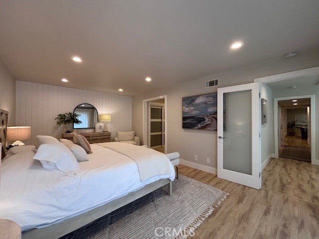 2920 Camino Capistrano, Unit 9D San Clemente, CA 92672 - Photo 16 of 54 a bedroom with a large bed and a tv
