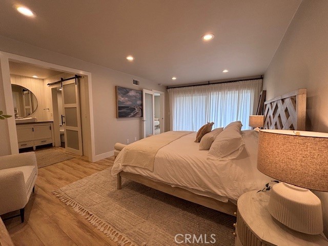 2920 Camino Capistrano, Unit 9D San Clemente, CA 92672 - Photo 21 of 54 a bed room with a bed and a couch