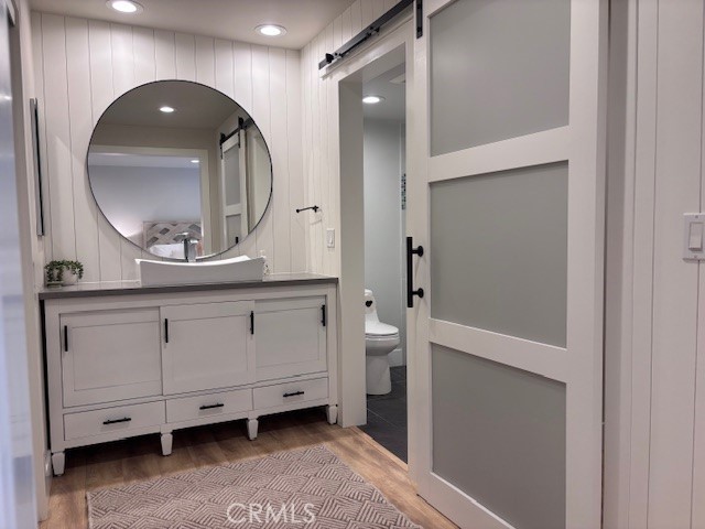 2920 Camino Capistrano, Unit 9D San Clemente, CA 92672 - Photo 23 of 54 a bathroom with a double vanity sink and a mirror