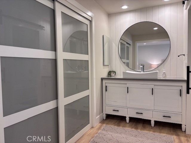 2920 Camino Capistrano, Unit 9D San Clemente, CA 92672 - Photo 24 of 54 a bathroom with a double vanity sink and a mirror