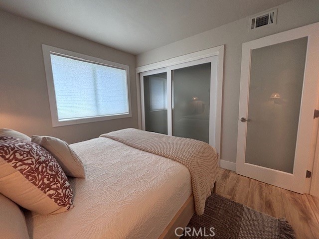2920 Camino Capistrano, Unit 9D San Clemente, CA 92672 - Photo 31 of 54 a bedroom with a bed and a window