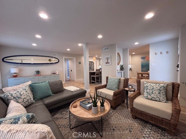 2920 Camino Capistrano, Unit 9D San Clemente, CA 92672 - Photo 5 of 54 a living room with furniture and a view of kitchen