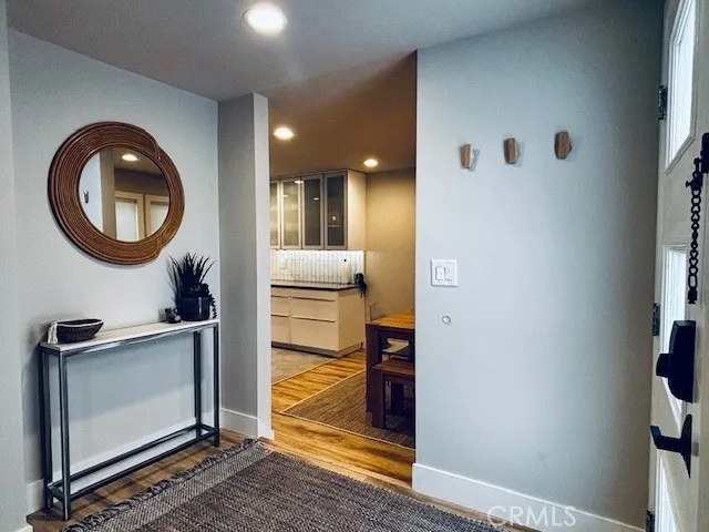 a view of a hallway with washer and dryer