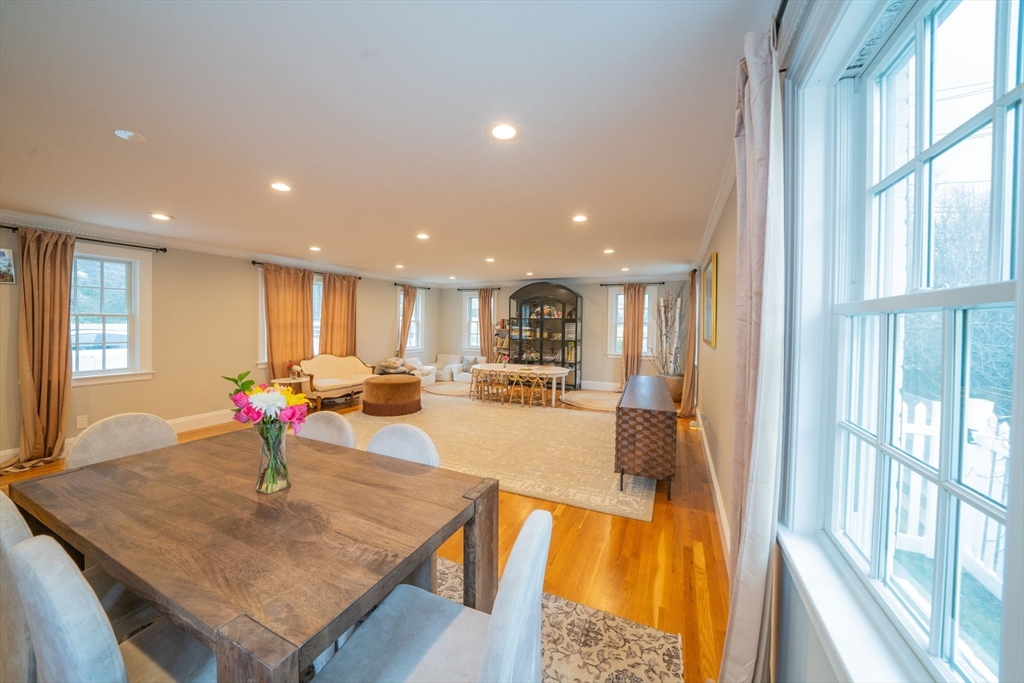 642 Centre Street Newton, MA 02458 - Photo 11 of 37 a living room with dining table furniture and a table