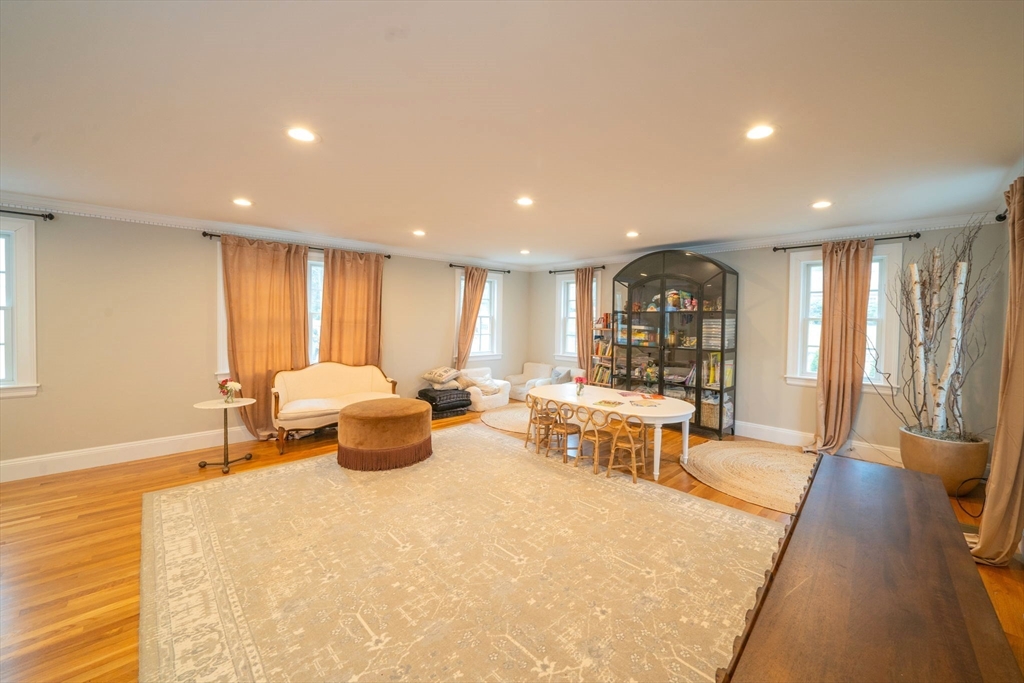 642 Centre Street Newton, MA 02458 - Photo 12 of 37 a living room with furniture and a table