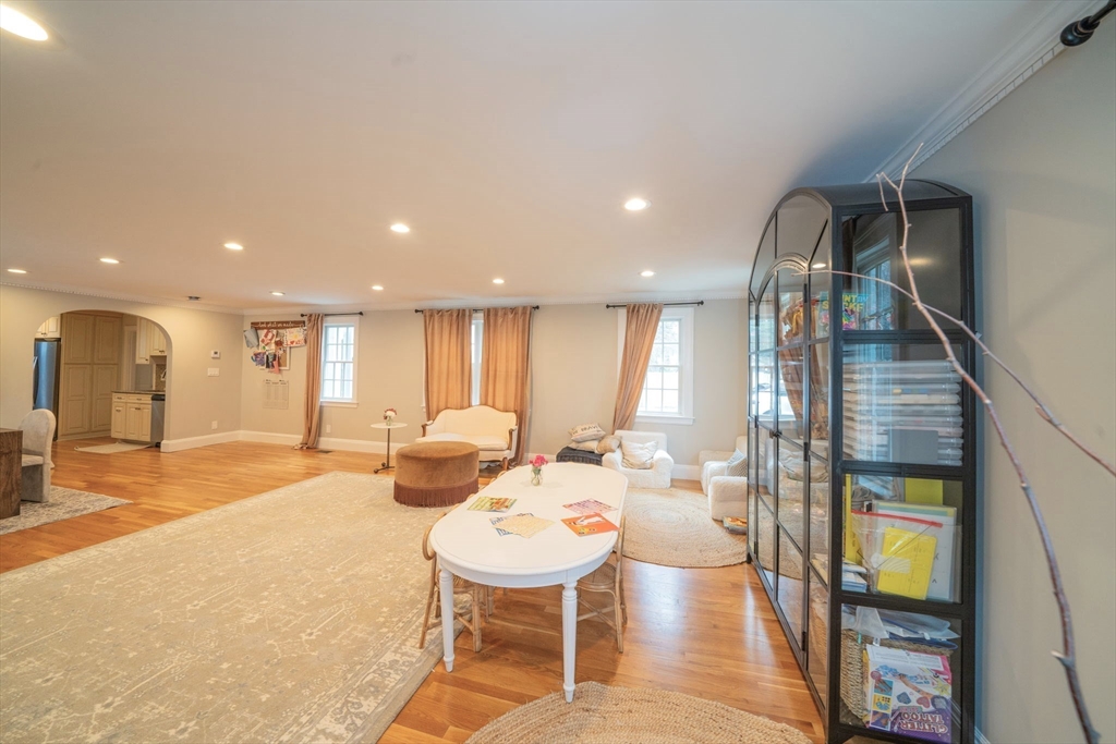 642 Centre Street Newton, MA 02458 - Photo 13 of 37 a living room with lots of furniture and view of kitchen