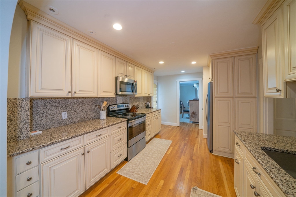 642 Centre Street Newton, MA 02458 - Photo 2 of 37 a large kitchen with cabinets