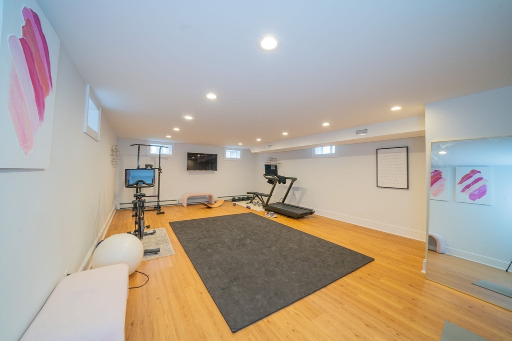 642 Centre Street Newton, MA 02458 - Photo 35 of 37 a very nice looking living room with a large pool table and chairs