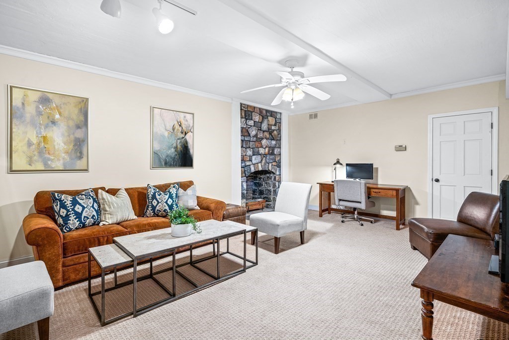 642 Centre Street Newton, MA 02458 - Photo 36 of 37 a living room with furniture and wooden floor