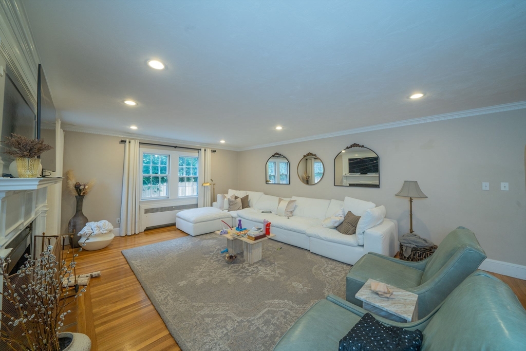 642 Centre Street Newton, MA 02458 - Photo 5 of 37 a living room with furniture and a flat screen tv