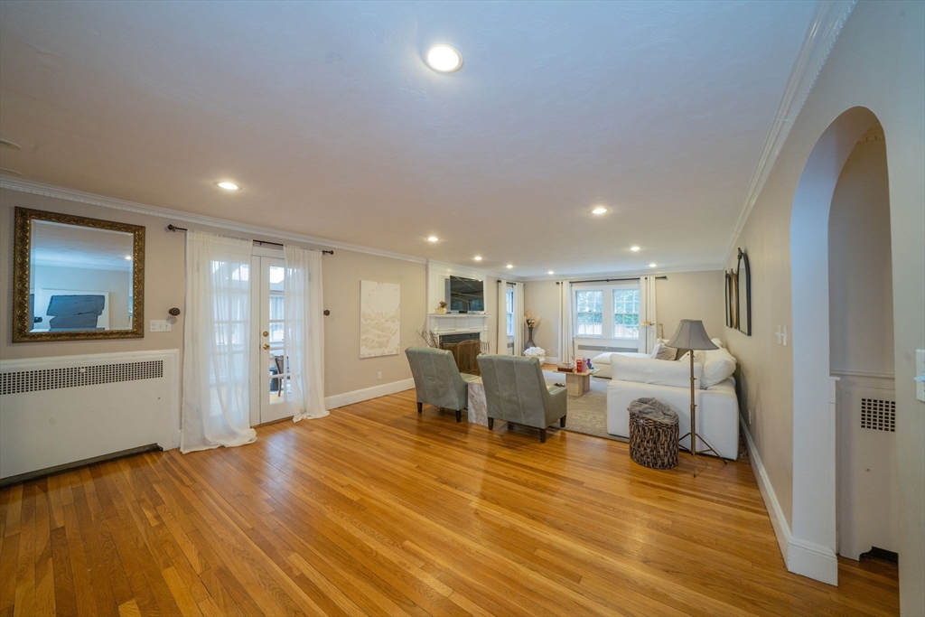 642 Centre Street Newton, MA 02458 - Photo 6 of 37 a view of a dining hall with furniture and wooden floor