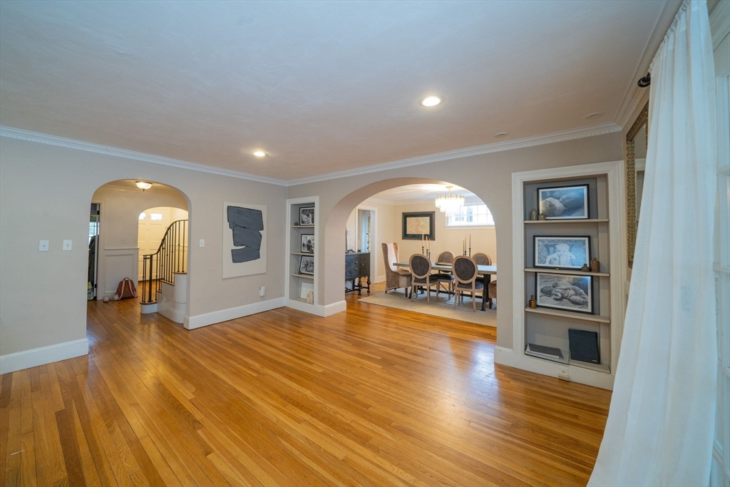 642 Centre Street Newton, MA 02458 - Photo 7 of 37 a view of a livingroom with furniture hardwood floor and a ceiling fan