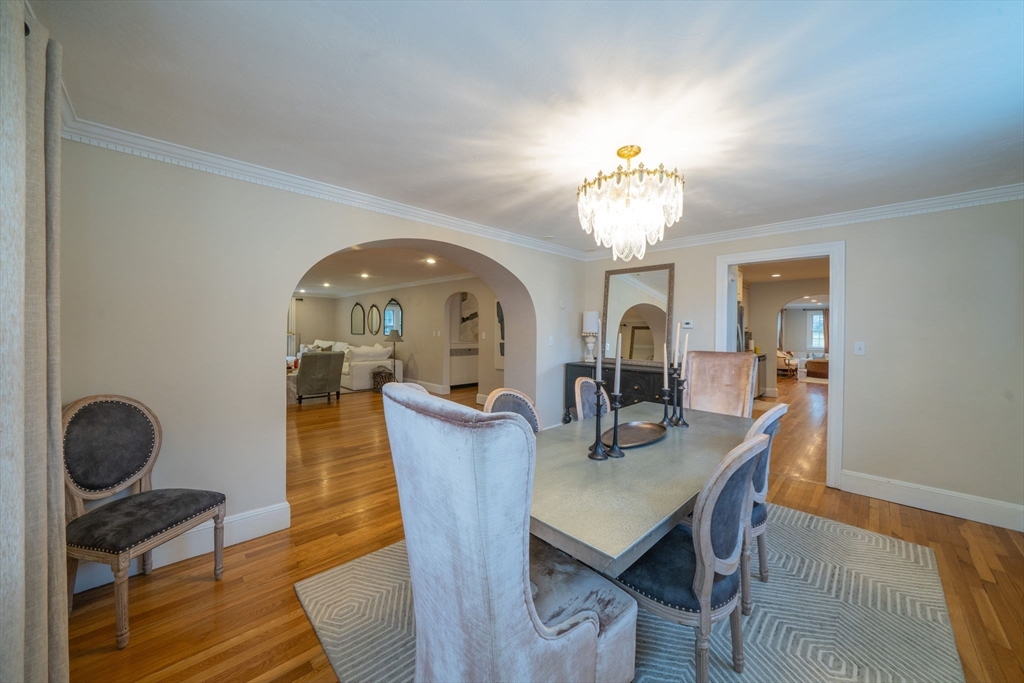 642 Centre Street Newton, MA 02458 - Photo 8 of 37 a dining room with furniture and wooden floor