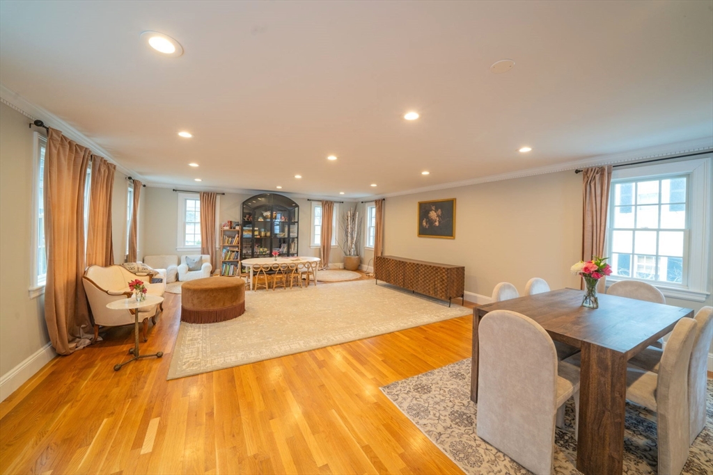 642 Centre Street Newton, MA 02458 - Photo 10 of 37 a large living room with stainless steel appliances furniture