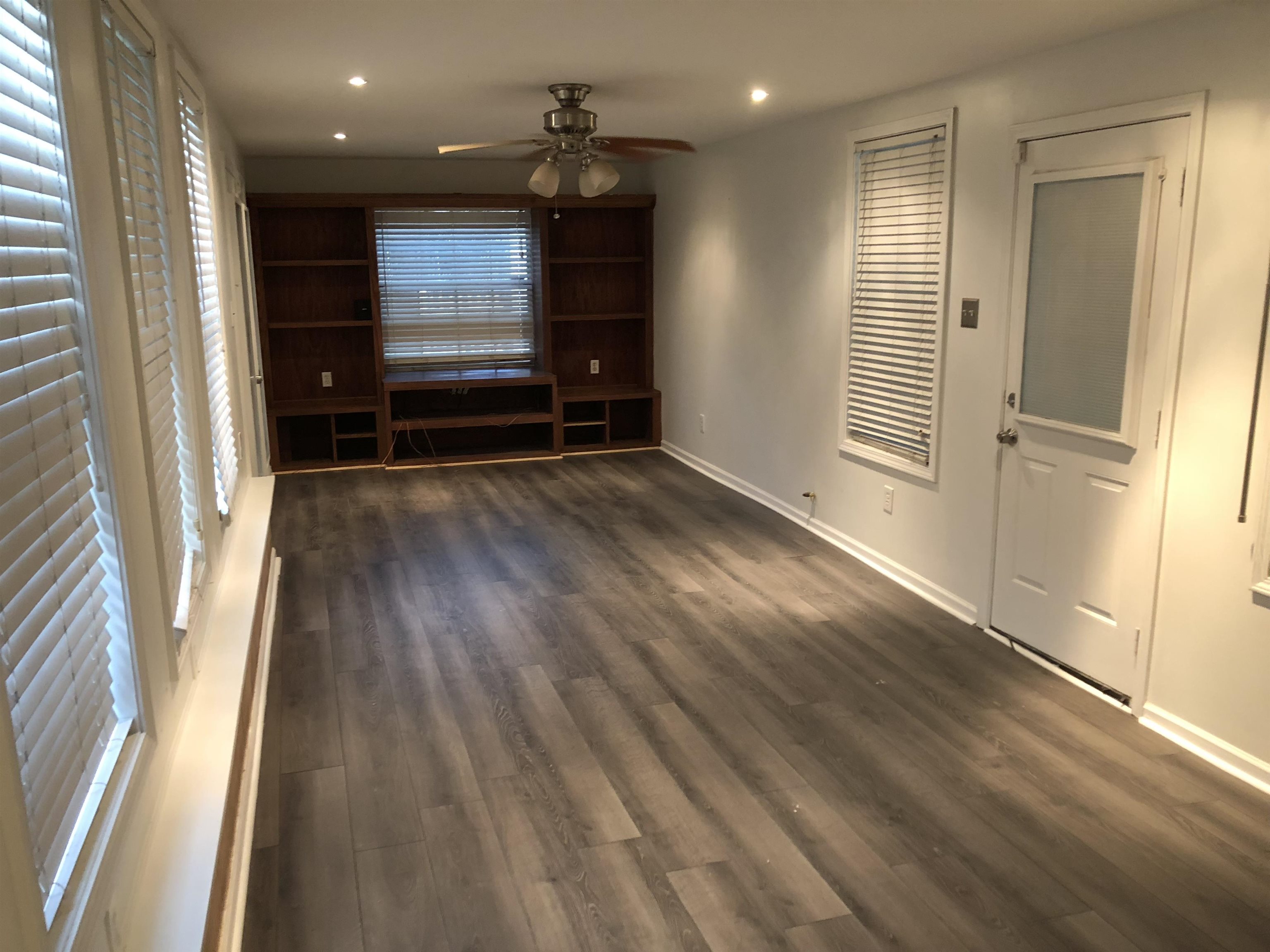 3628 Carrington Road Memphis, TN 38111 - Photo 11 of 11 Spare room with ceiling fan and dark hardwood / wood-style flooring