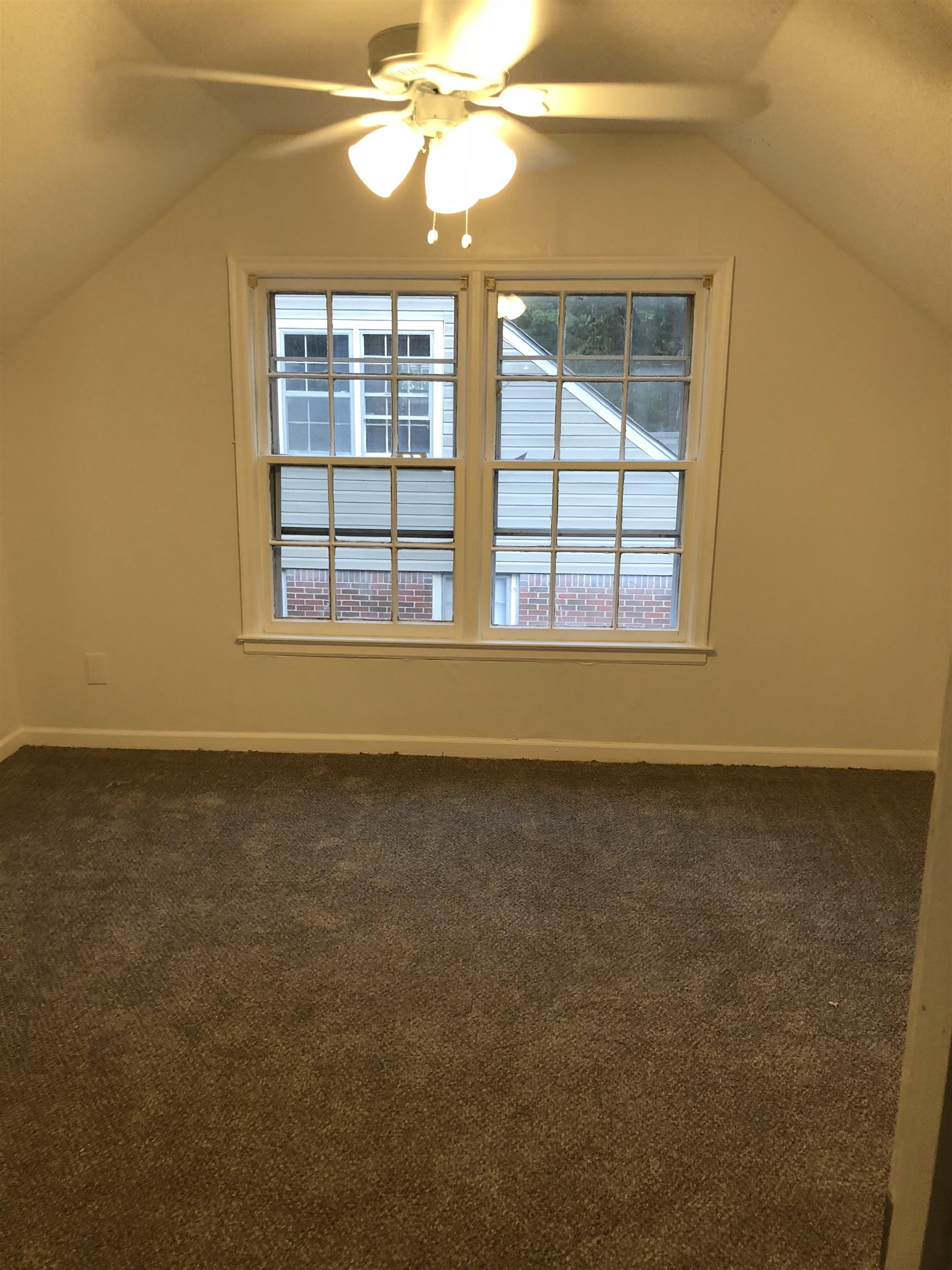 3628 Carrington Road Memphis, TN 38111 - Photo 7 of 11 Bonus room featuring dark colored carpet, ceiling fan, and vaulted ceiling