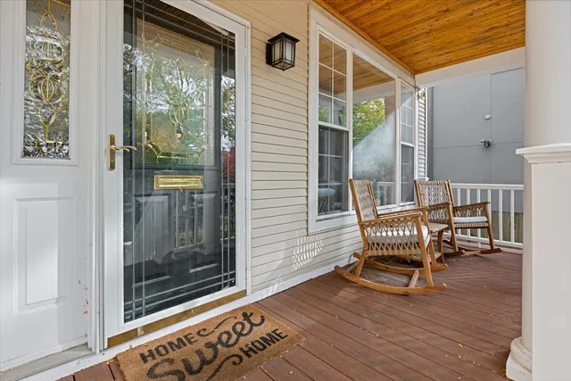 a view of chair and tables in the balcony