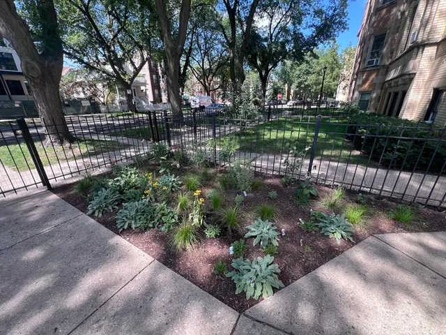 a garden view with a seating space