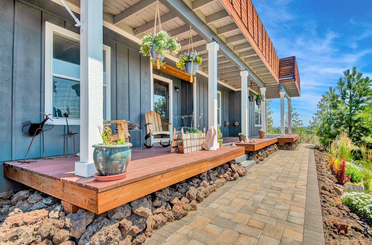 19112 Pumice Butte Road Bend, OR 97702 - Photo 34 of 36 a view of a chairs and table in a patio