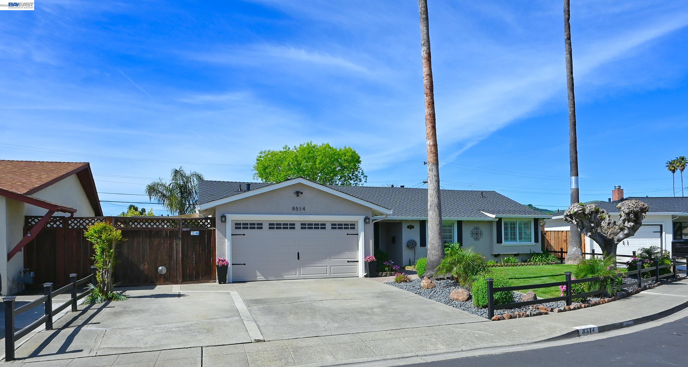 8514 Newry Place Dublin, CA 94568 - Photo 1 of 1 a front view of a house with a yard and garage