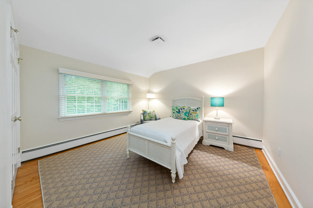 78 Stanton Road Darien, CT 06820 - Photo 21 of 33 a spacious bedroom with a bed and window