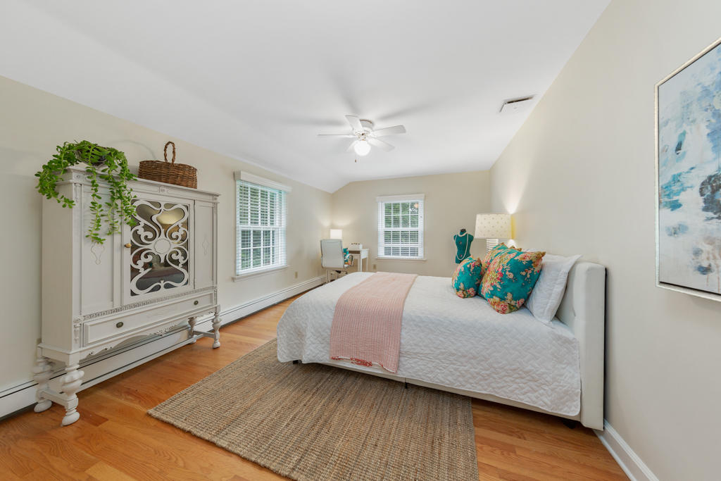 78 Stanton Road Darien, CT 06820 - Photo 23 of 33 a living room with furniture and a potted plant