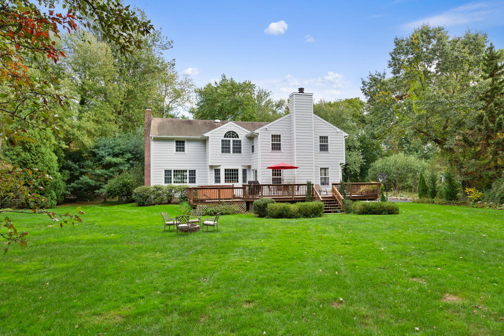 78 Stanton Road Darien, CT 06820 - Photo 27 of 33 a view of a house with a backyard porch and sitting area
