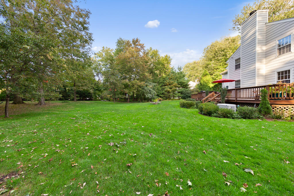78 Stanton Road Darien, CT 06820 - Photo 28 of 33 a view of a backyard with a garden