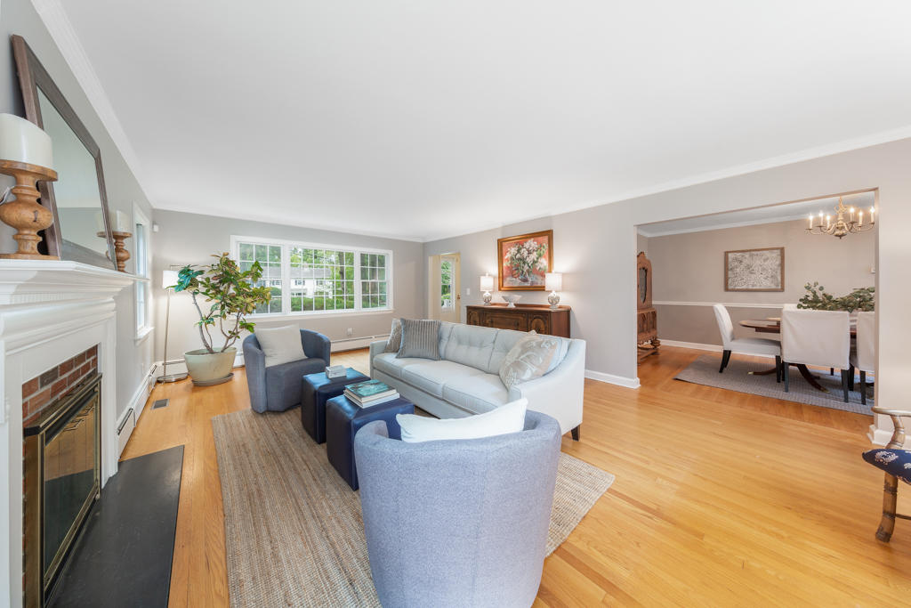 78 Stanton Road Darien, CT 06820 - Photo 5 of 33 a living room with furniture and a fireplace