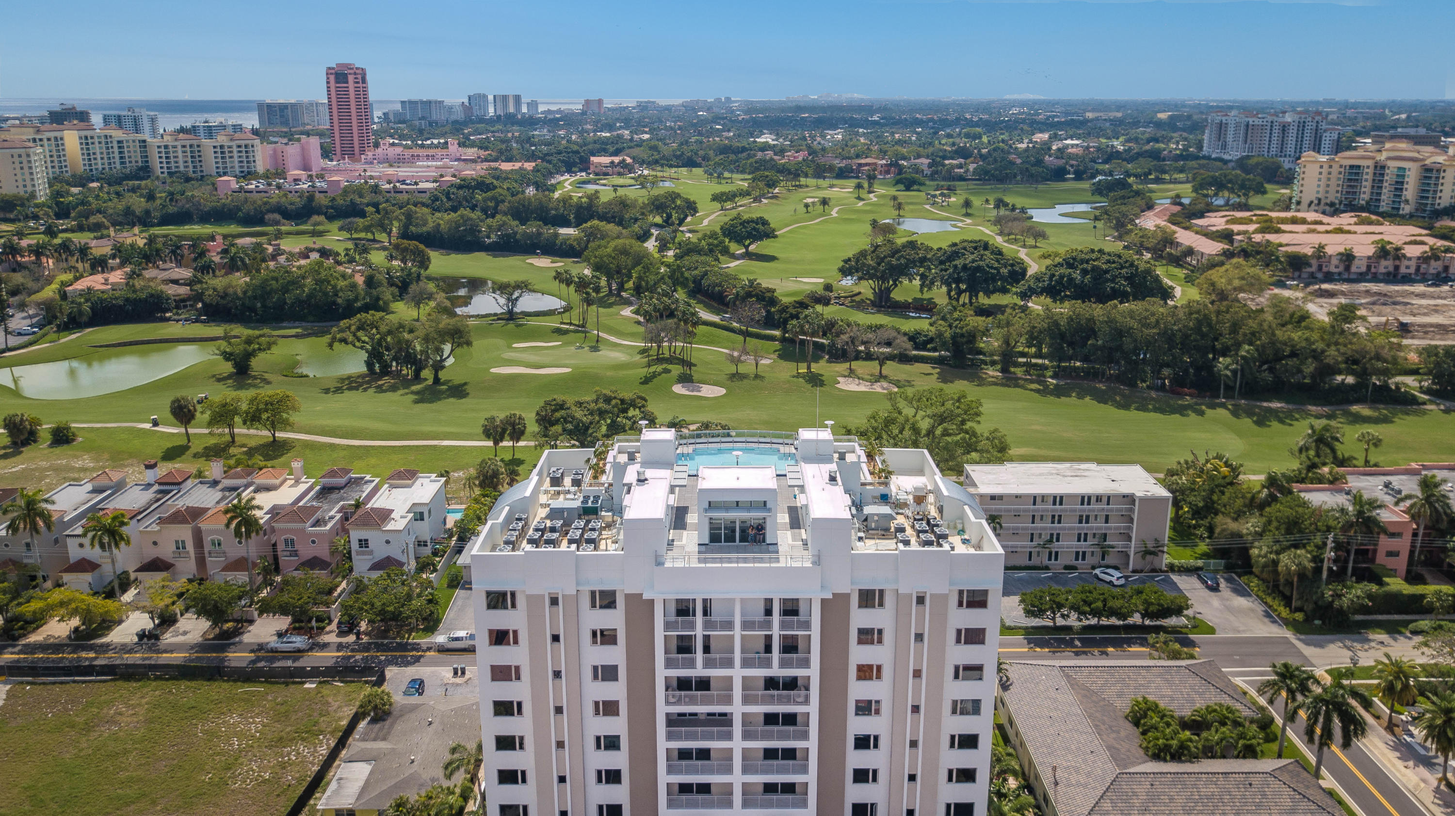 327 East Royal Palm Road, Unit 203 Boca Raton, FL 33432 - Photo 12 of 46 a view of a city with lawn chairs