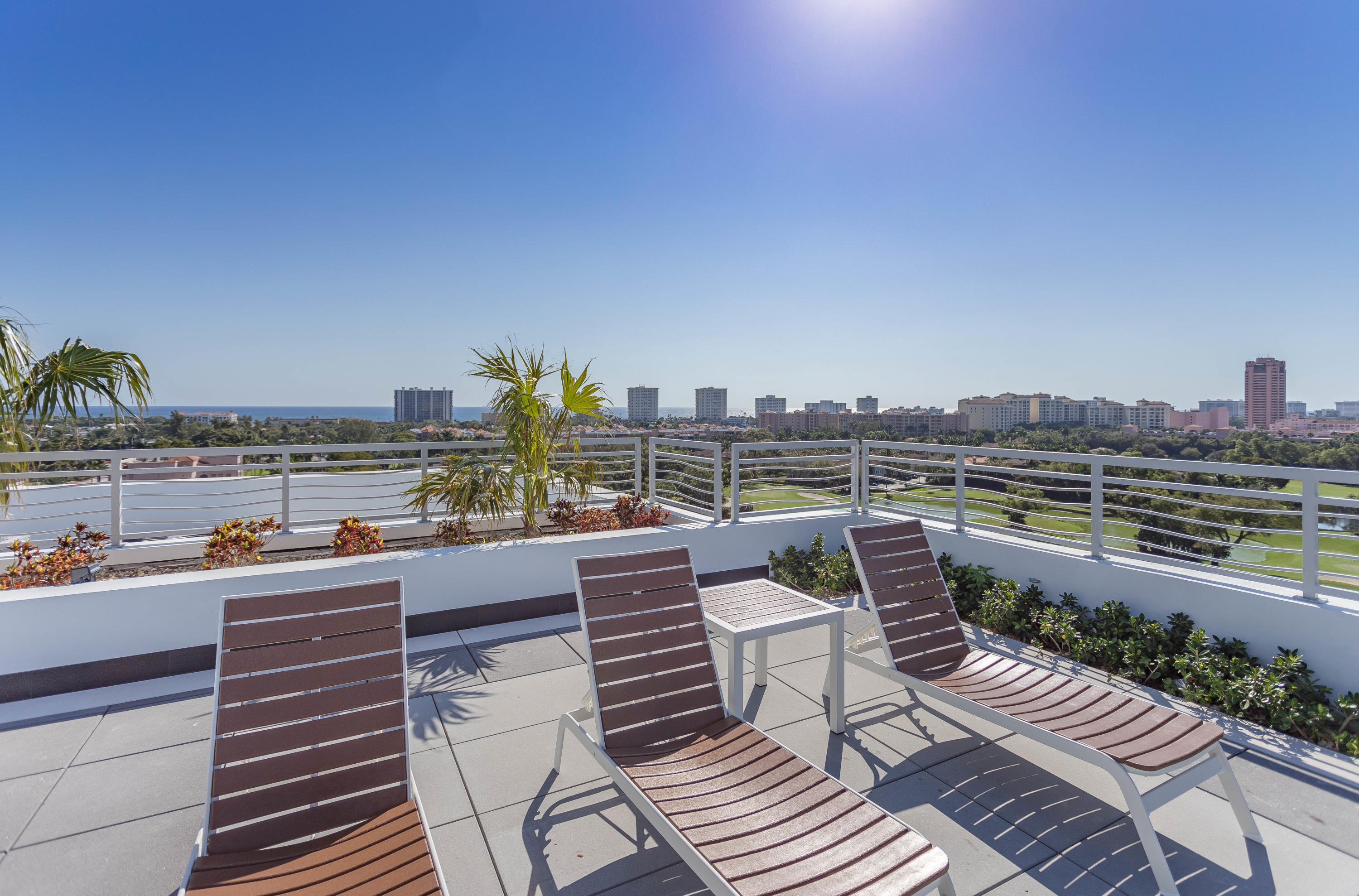 327 East Royal Palm Road, Unit 203 Boca Raton, FL 33432 - Photo 16 of 46 a view of a balcony with city view