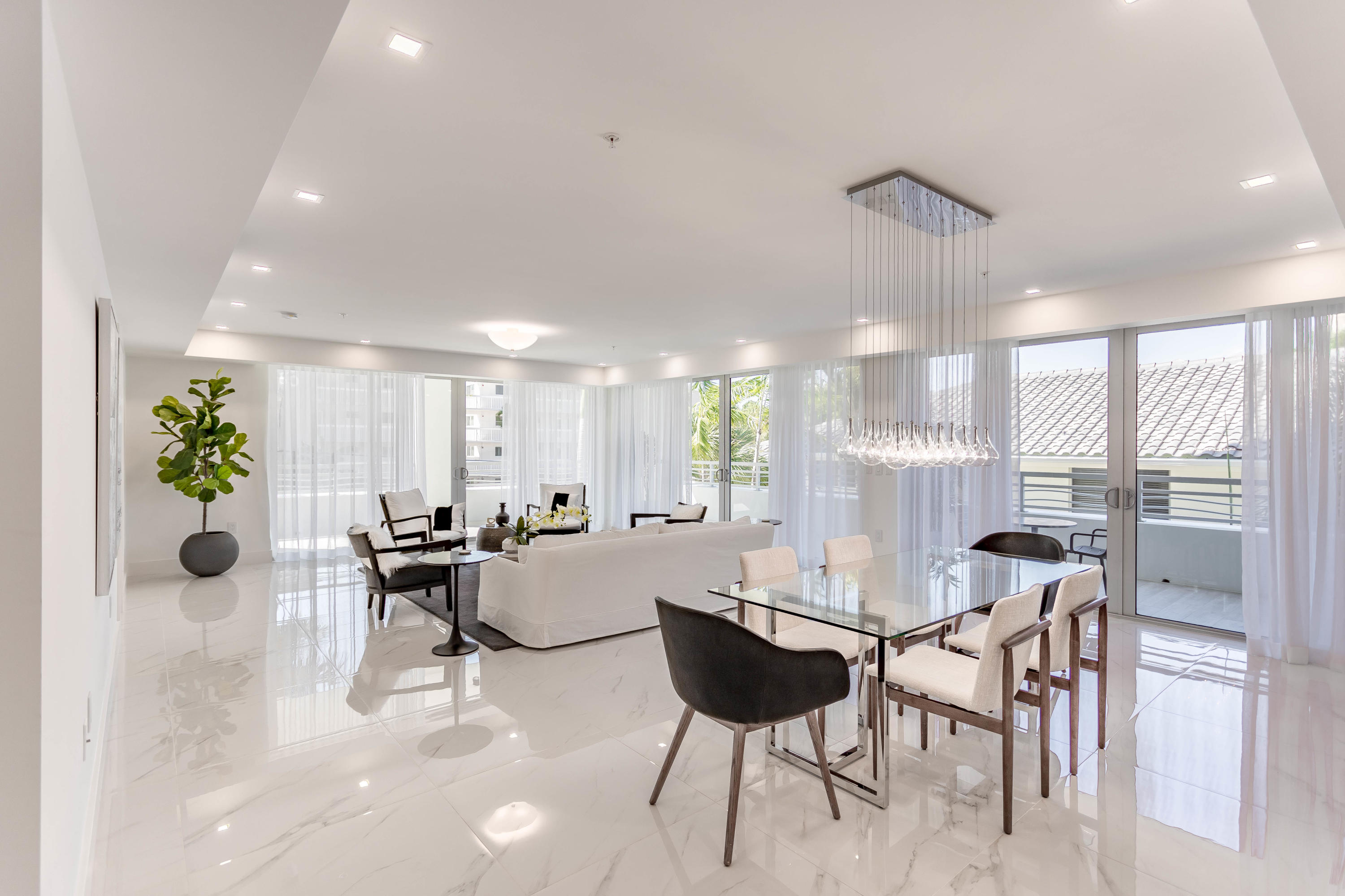 327 East Royal Palm Road, Unit 203 Boca Raton, FL 33432 - Photo 23 of 46 a view of a dining room with furniture